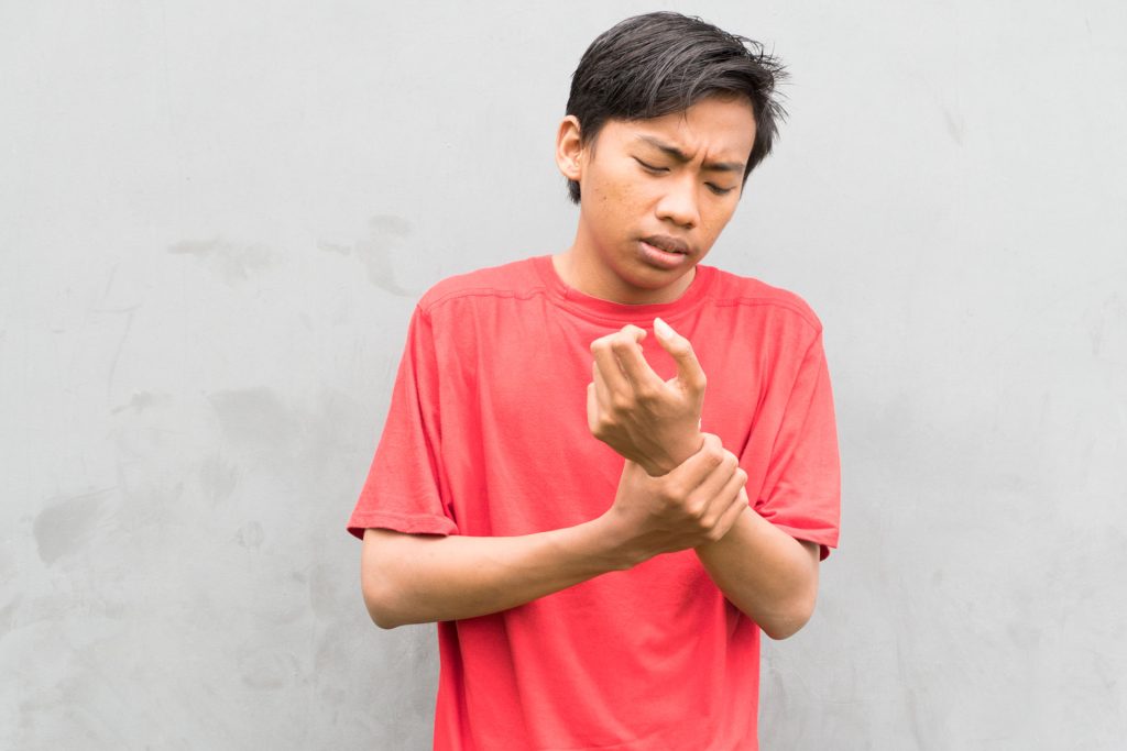 Young man with wrist pain.