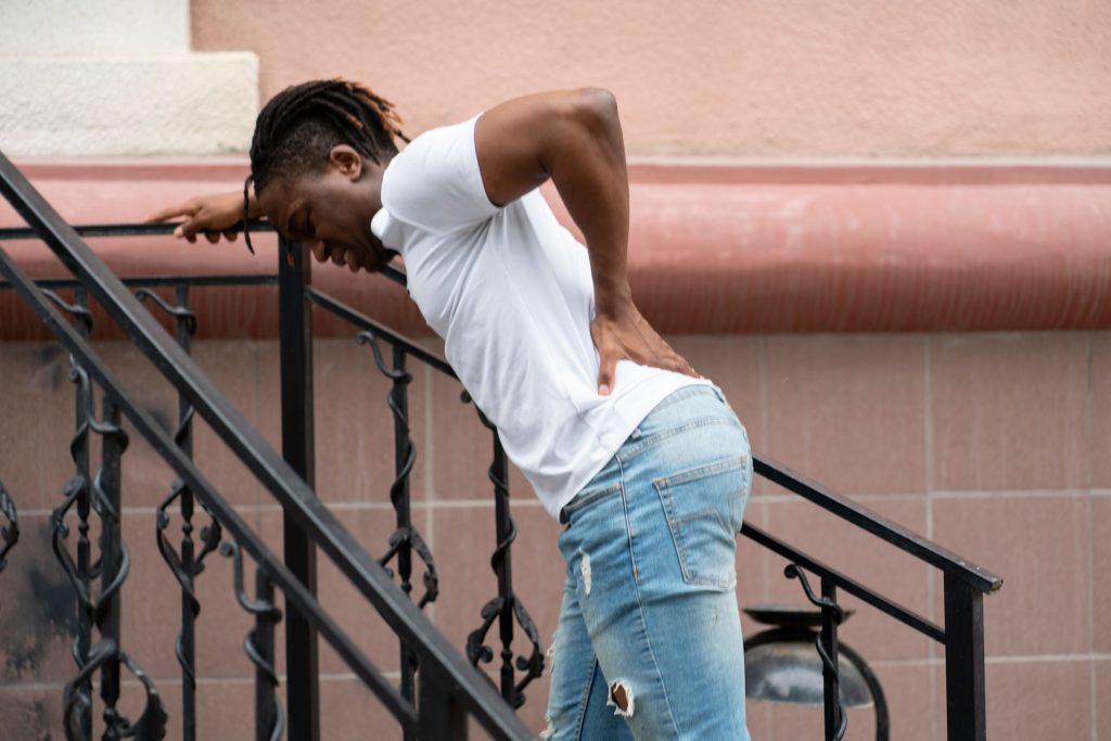 Back pain of a young person.