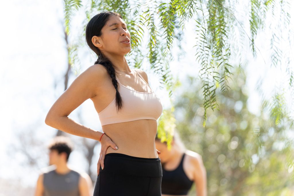 Woman with lower back pain.