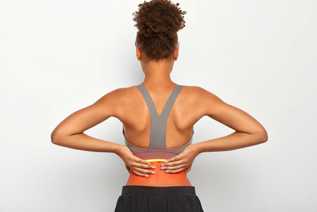 Woman with back pain.